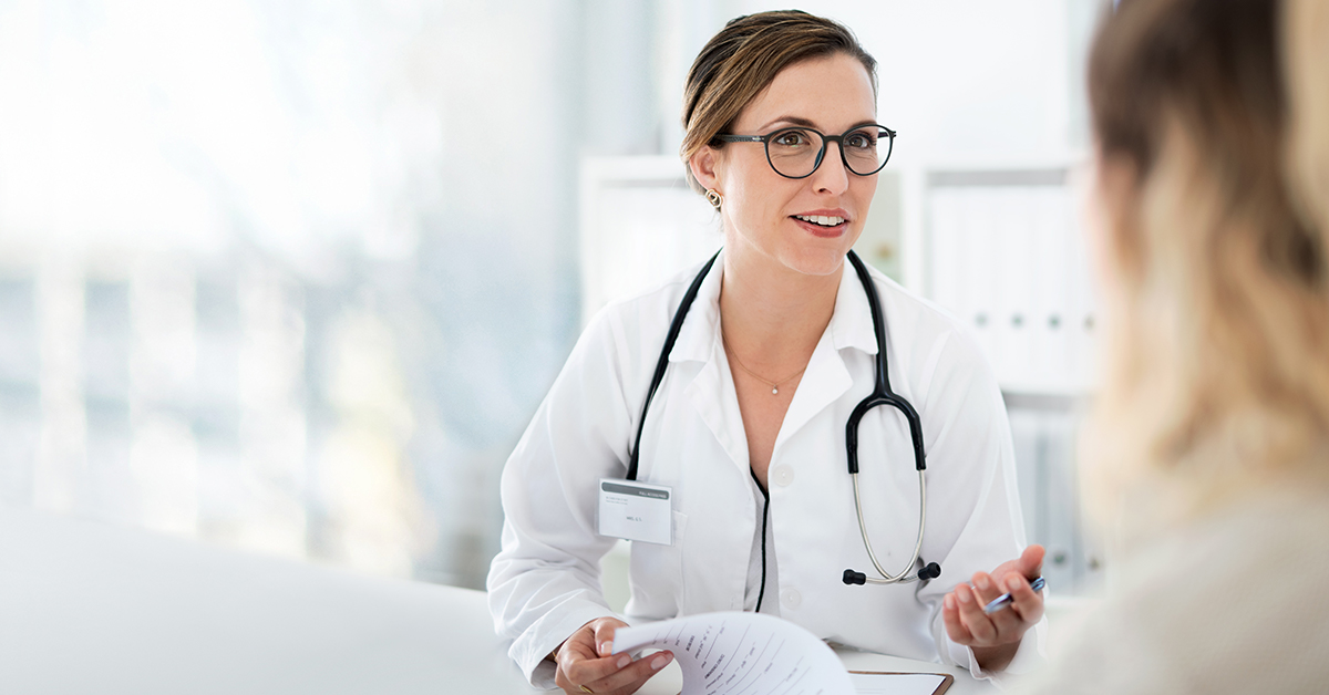 A female doctor explaining to her patient