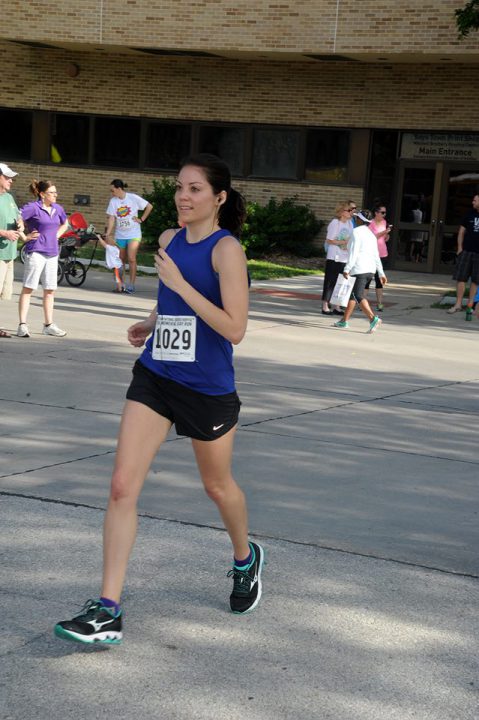 A woman running with the number 1029 on her front